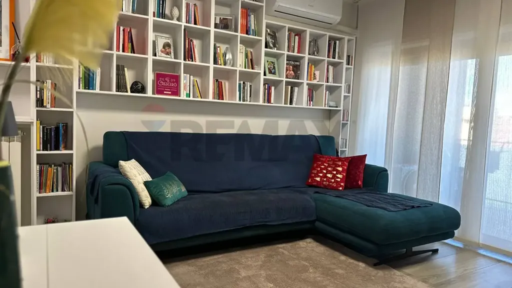 Living Room - Modern Apartment with Balcony in Cosenza