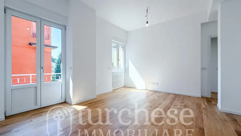 Living Room - Modernised Two-Bedroom Apartment in Bergamo
