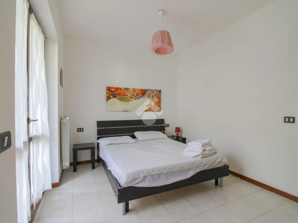Chambres - Twin-Storey Apartment with Lake View in Vigole