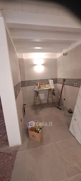 Rooms - Elegant Trilocale with Private Patio in Como