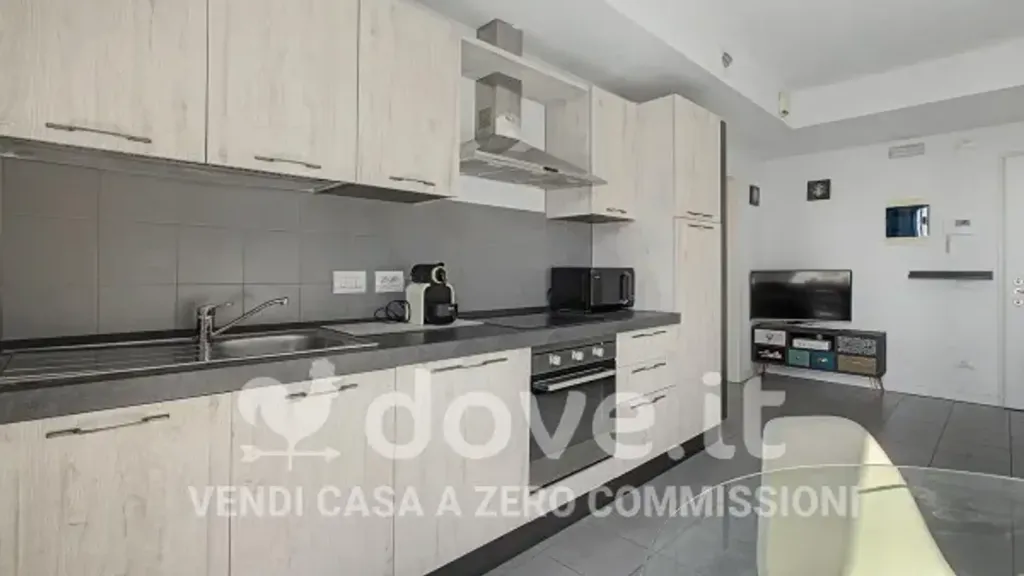 Kitchen - Modern Apartment with Balcony in Milan