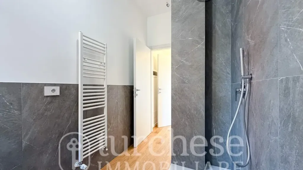 Bathrooms - Modernised Two-Bedroom Apartment in Bergamo