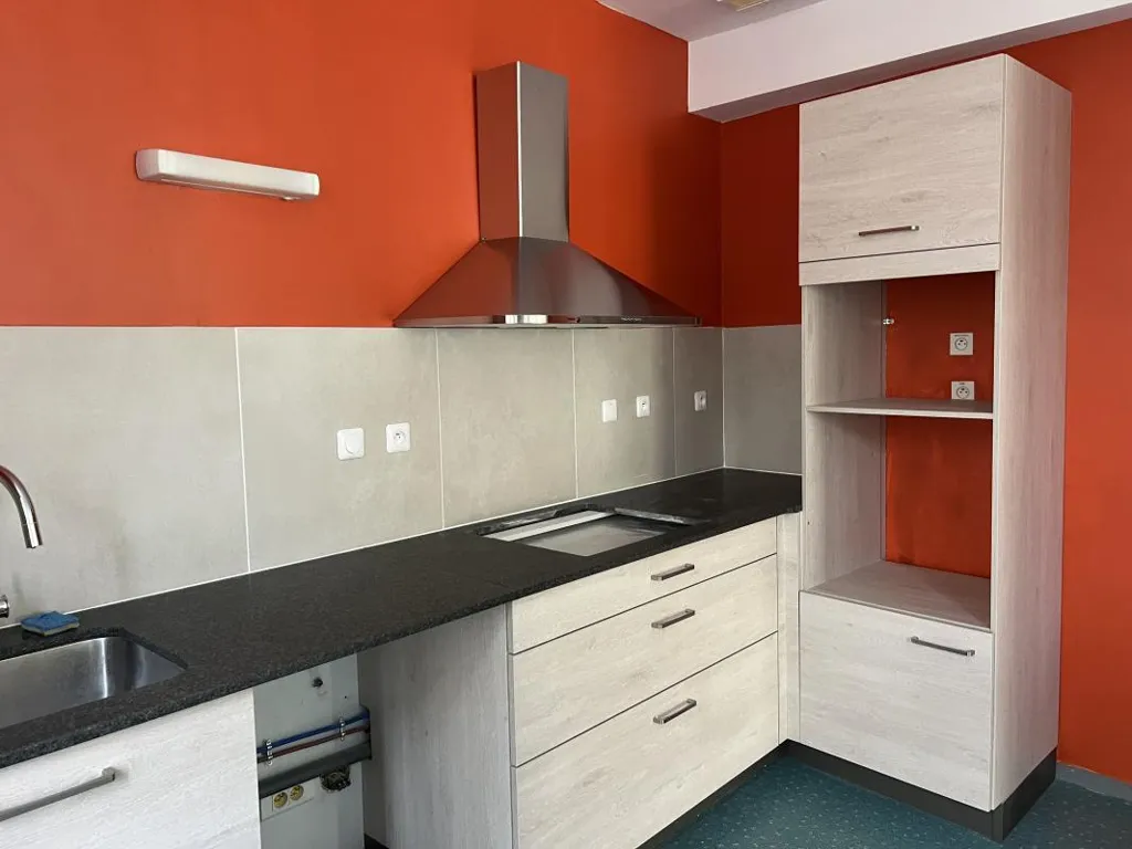 Cuisine - Appartement Ensoleillé avec Ascenseur en Centre-Ville