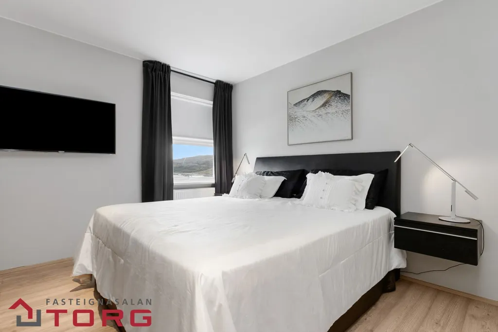 Bedrooms - Modernised Apartment with View in Grafarvogur