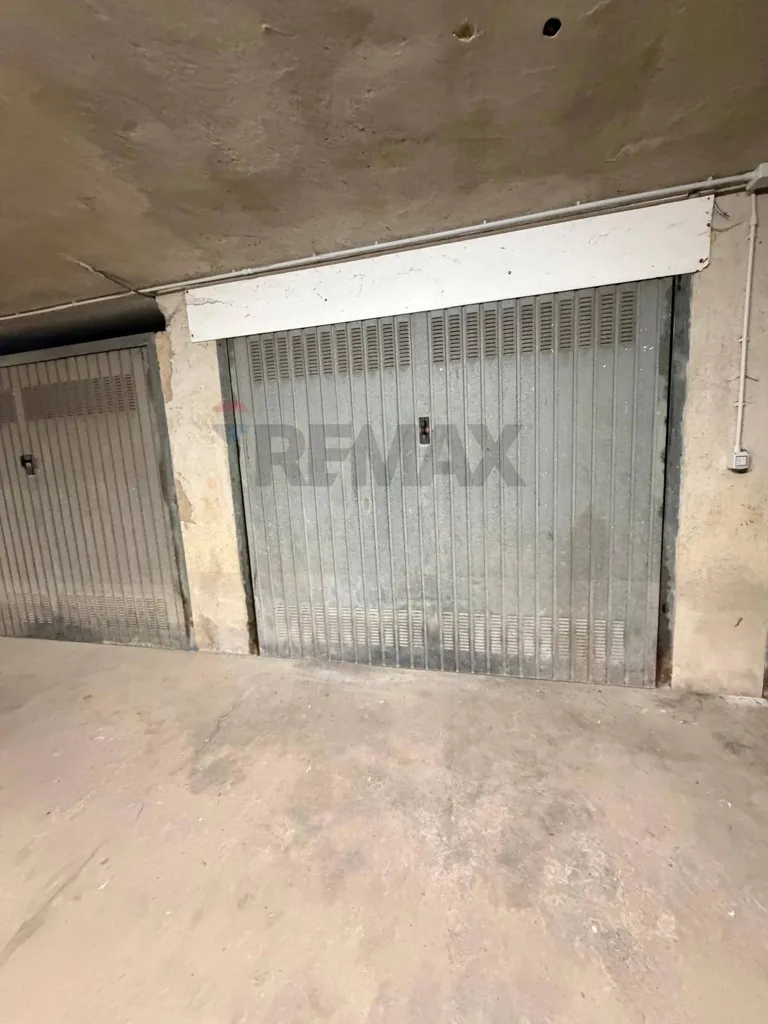 Garage - Spacious Apartment with Terrace in Cairo Montenotte