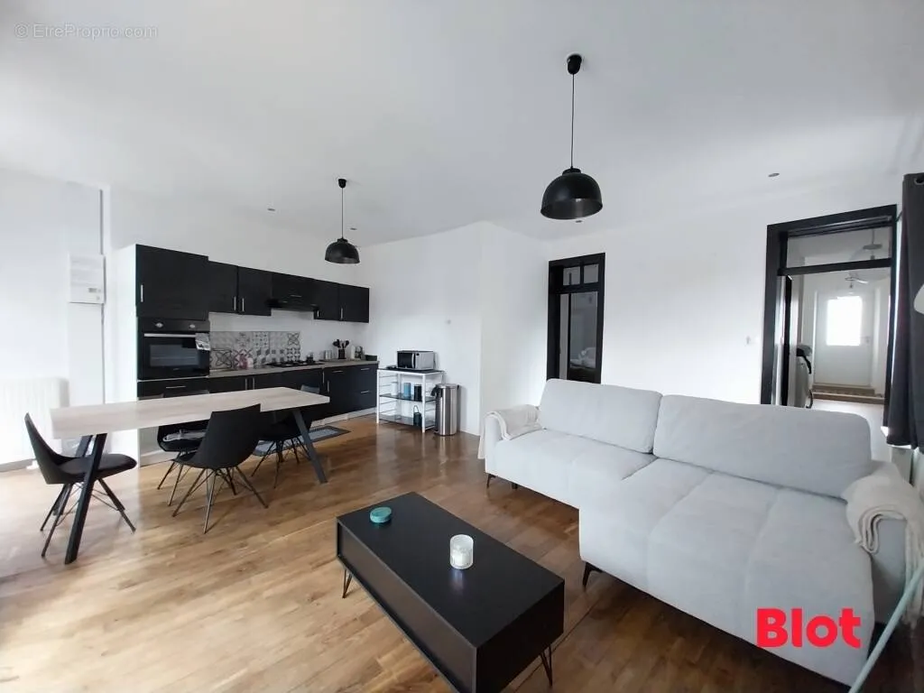 Living Room - Renovated 2-Bedroom Apartment in Plerguer