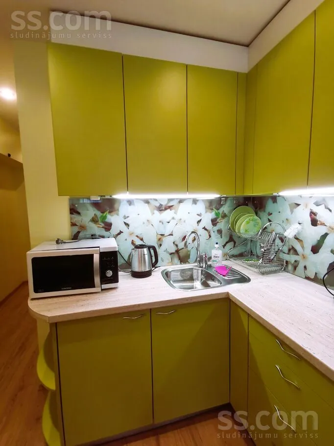 Kitchen - Bright Apartment with Secure Parking in Riga Centre