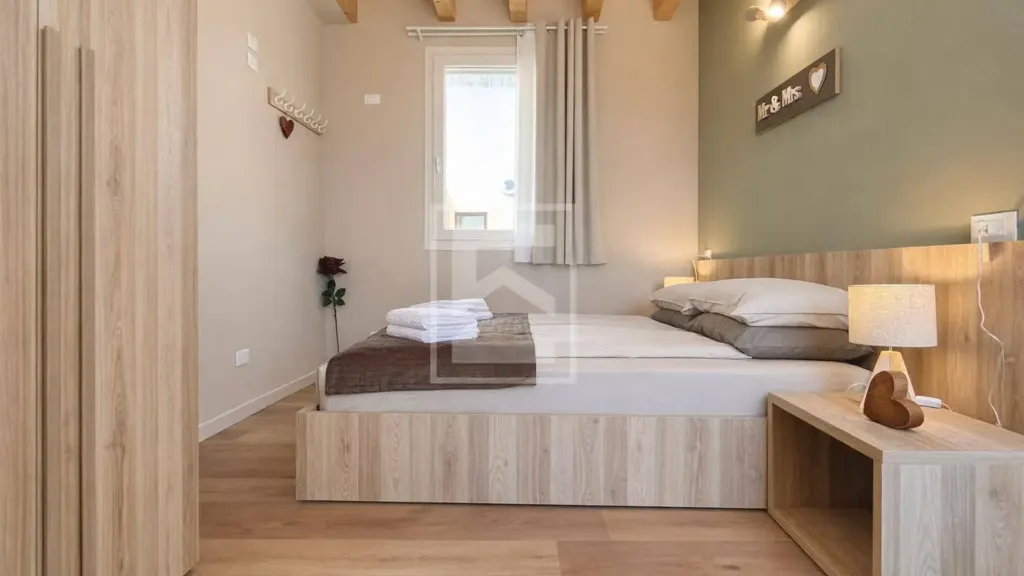 Bedrooms - Restored Triplex with Garden View in Manerba del Garda