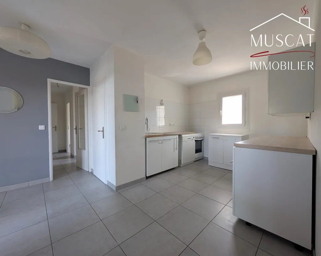 Cuisine - Appartement T3 avec loggia et garage à Villefontaine