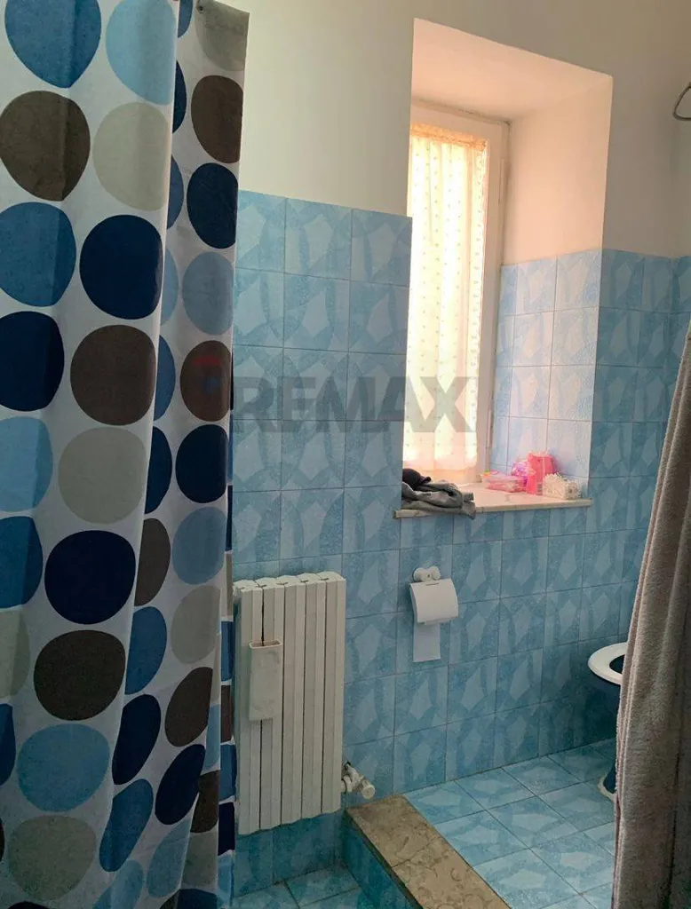 Salles de bain - Bright Apartment with Terrace in Monte Romano