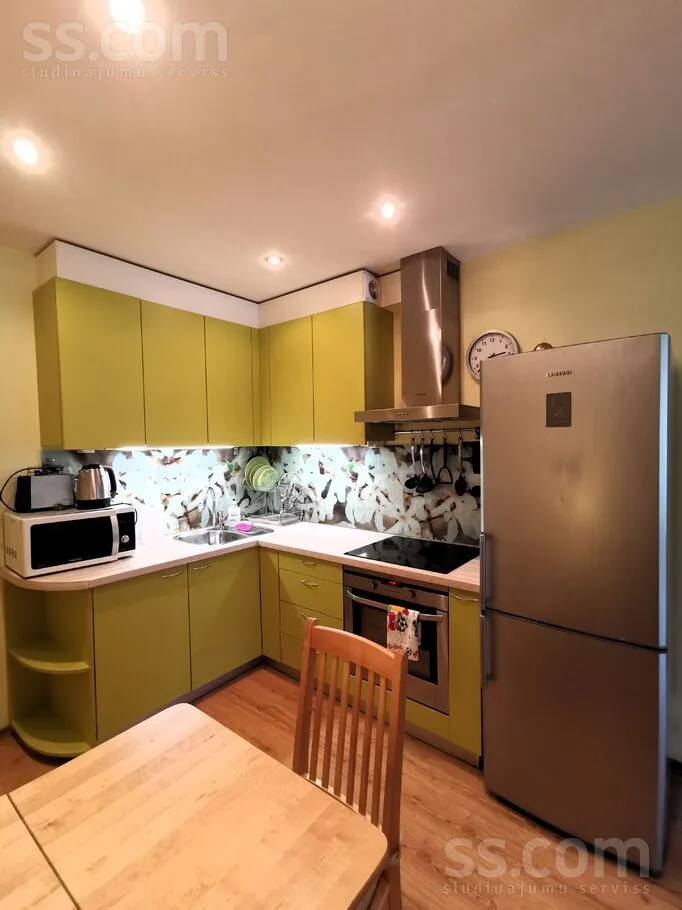 Kitchen - Bright Apartment with Secure Parking in Riga Centre