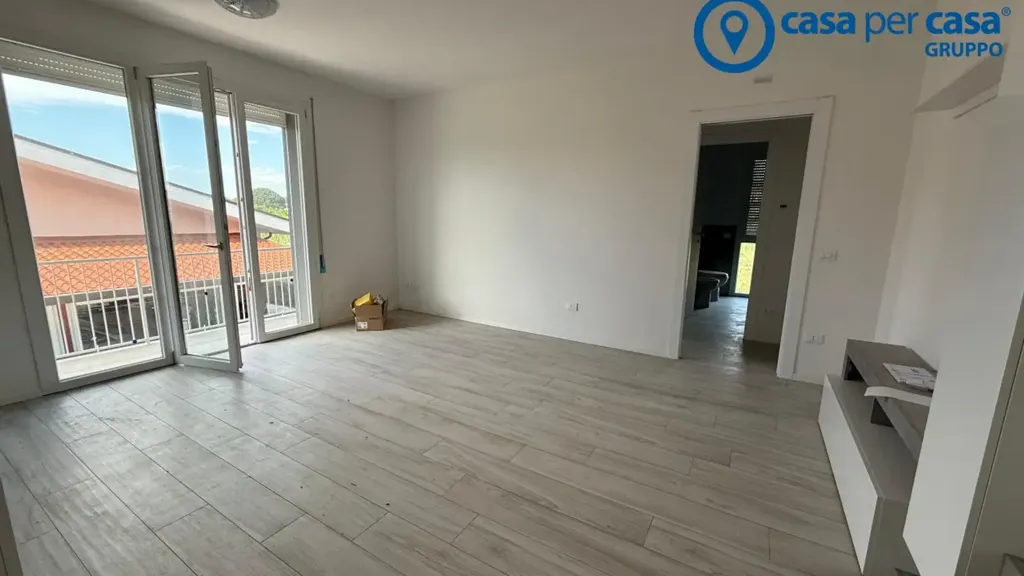 Séjour - Newly Built Apartment with Private Garden in Porto Viro