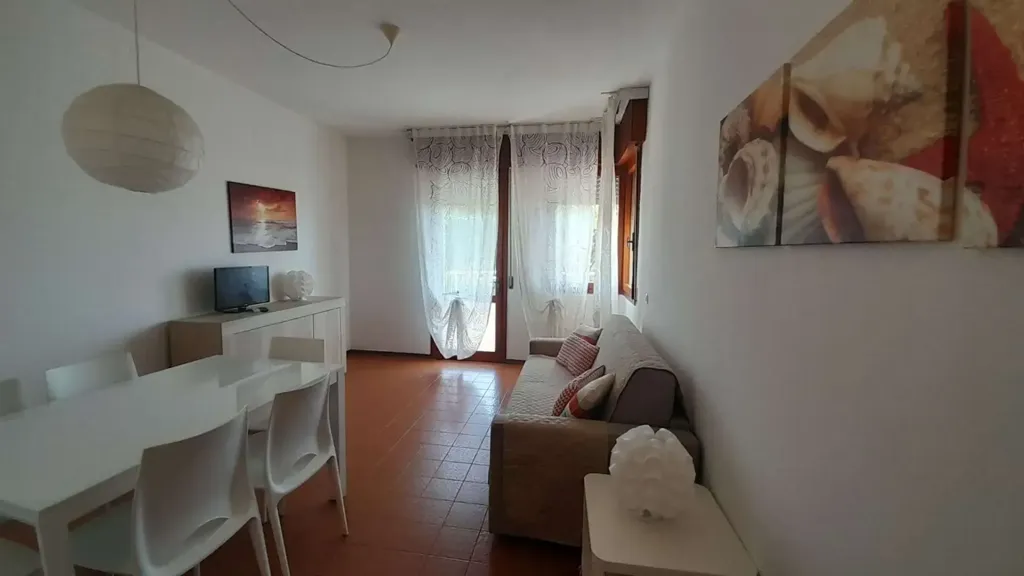 Salle à manger - Seafront Apartment with Pool in Jesolo