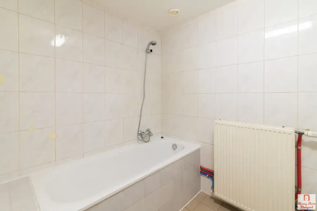 Bathrooms - Apartment Building with High Visibility in Herk-de-Stad