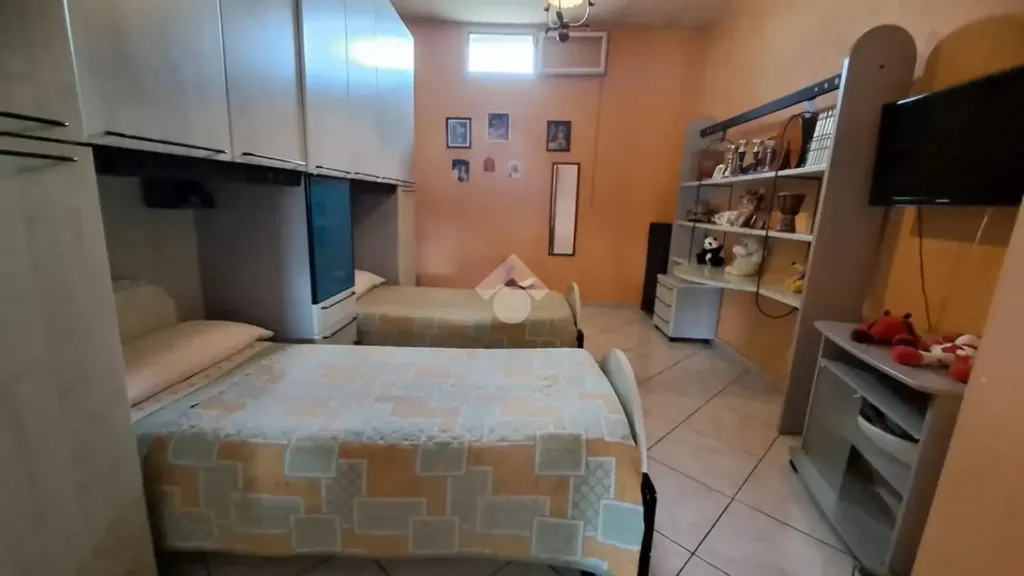 Bedrooms - Three-Bedroom Apartment with Fireplace in San Marcellino
