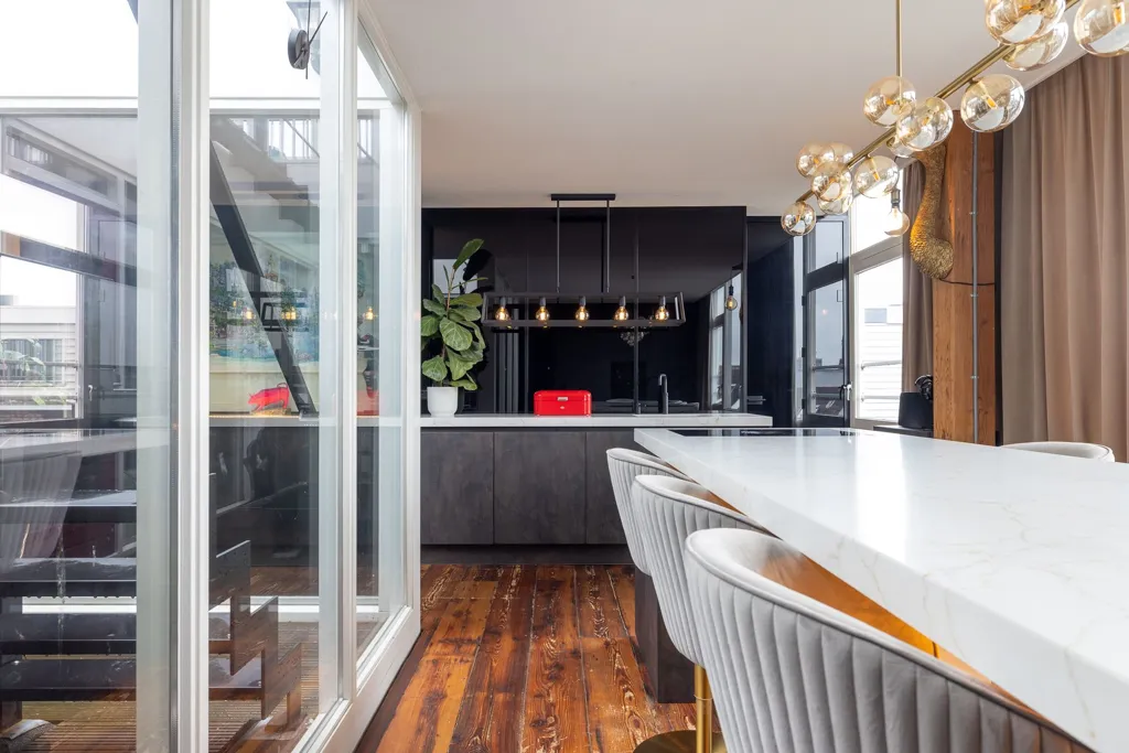 Kitchen - High-End Industrial Loft with Skyline View in Rotterdam