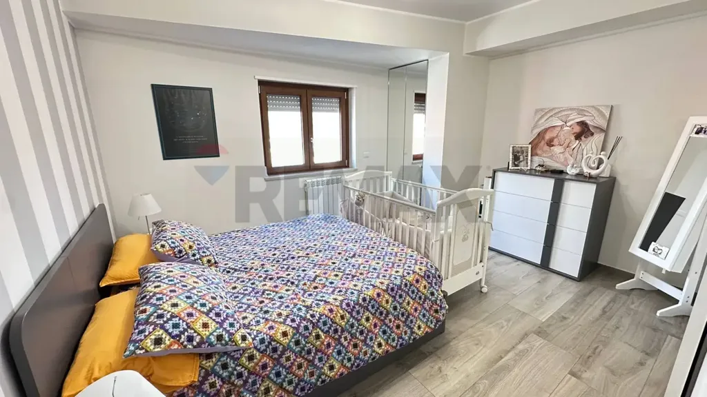 Bedrooms - Modern Apartment with Balcony in Cosenza