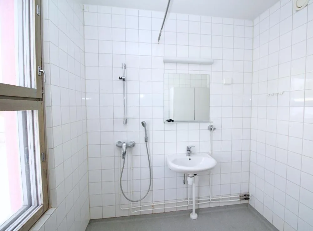 Bathrooms - Apartment with Balcony and Sauna in Kuopio