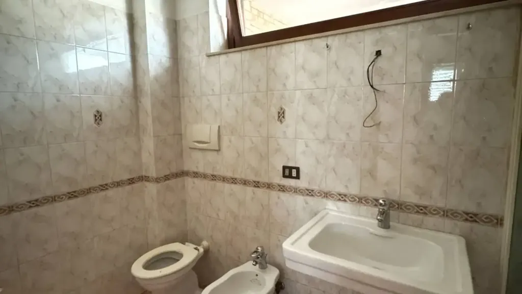Bathrooms - Modernised Apartment with Balcony in Fermo