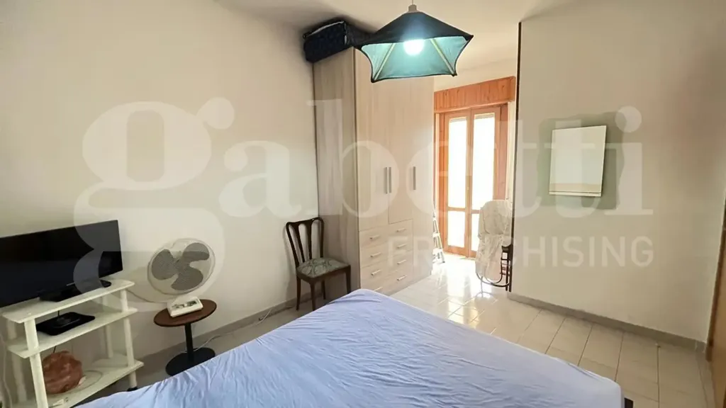 Chambres - 3-Bedroom Apartment with Balcony in Scalea