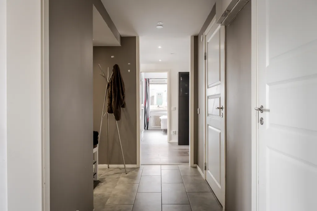 Entrée - Renovated Penthouse with Balcony in Borås