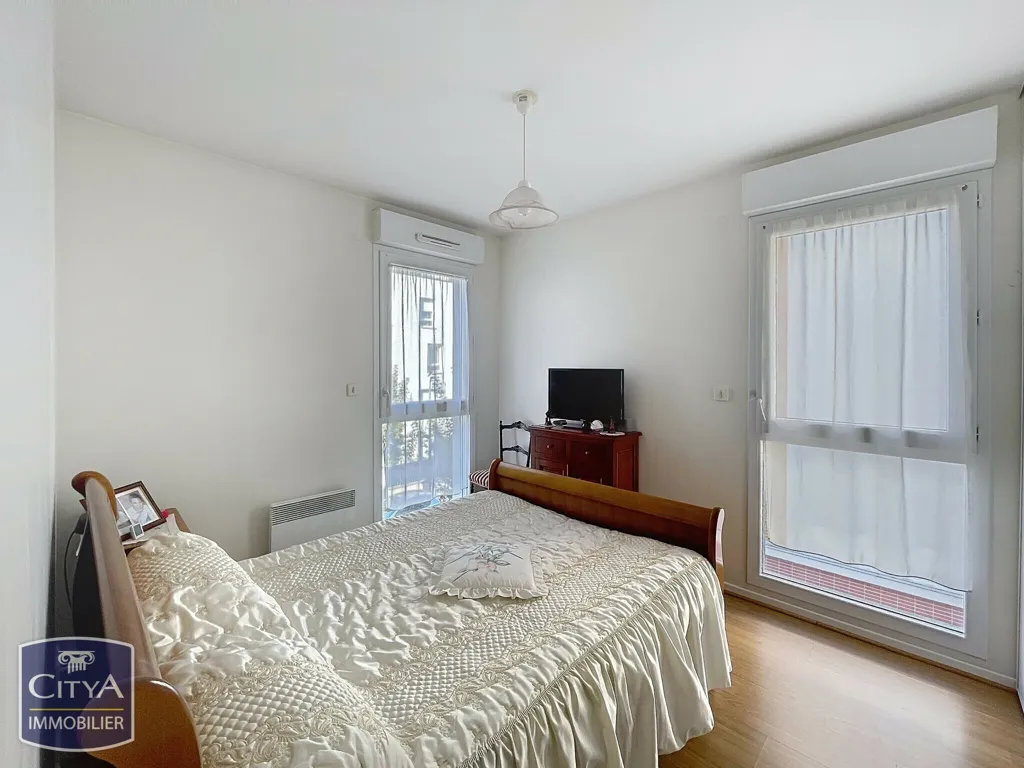 Bedrooms - Modern Apartment with Two Bedrooms in Lucé