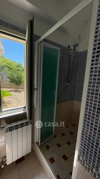 Bathrooms - Panoramic Apartments with Garden in Scalea