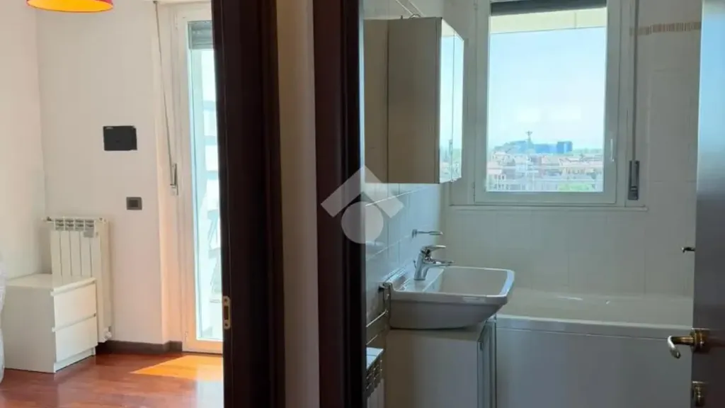 Bathrooms - Bright Bilocale with Terraces in Milan