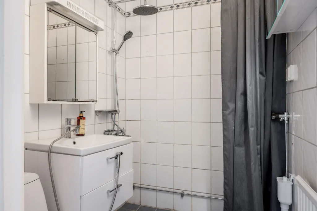 Bathrooms - Two-Bedroom Flat with Balcony in Sjöbo