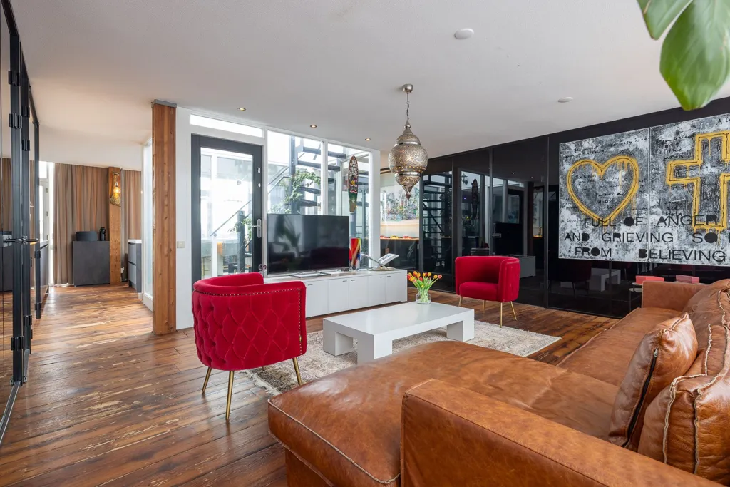 Living Room - High-End Industrial Loft with Skyline View in Rotterdam