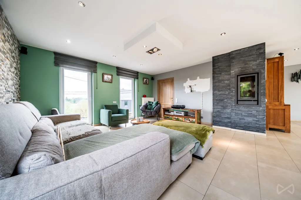 Living Room - House with Photovoltaic Panels in Courcelles