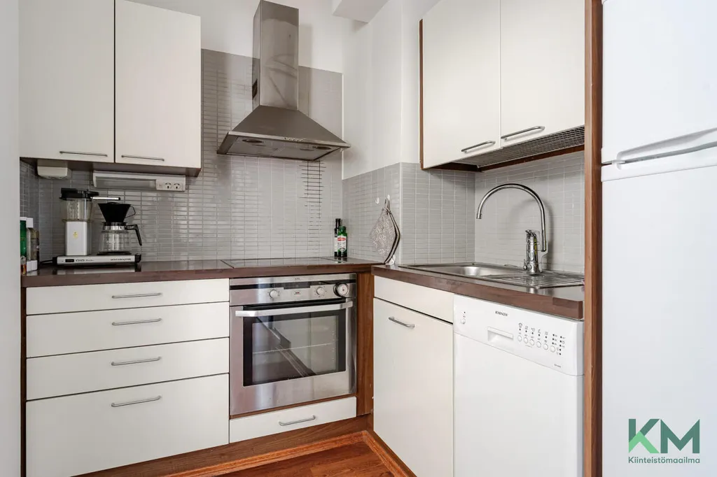 Kitchen - Upper Floor Apartment with Park View in Töölö
