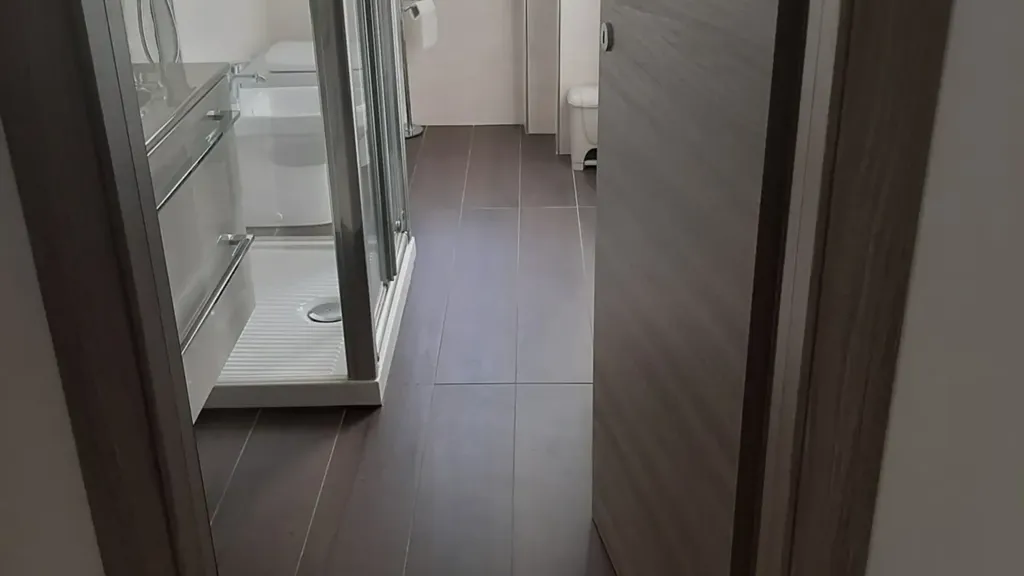 Bathrooms - Modernised Apartment with Balconies in Loano