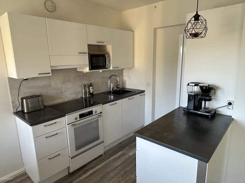 Kitchen - Renovated Apartment with Balcony in Tapiola
