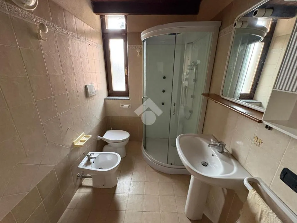 Bathrooms - Spacious 4-Bedroom Apartment in Sozzago