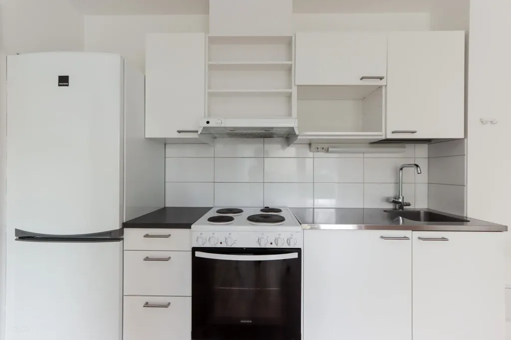 Cuisine - Efficiently Designed Apartment with French Balcony in Järvenperä