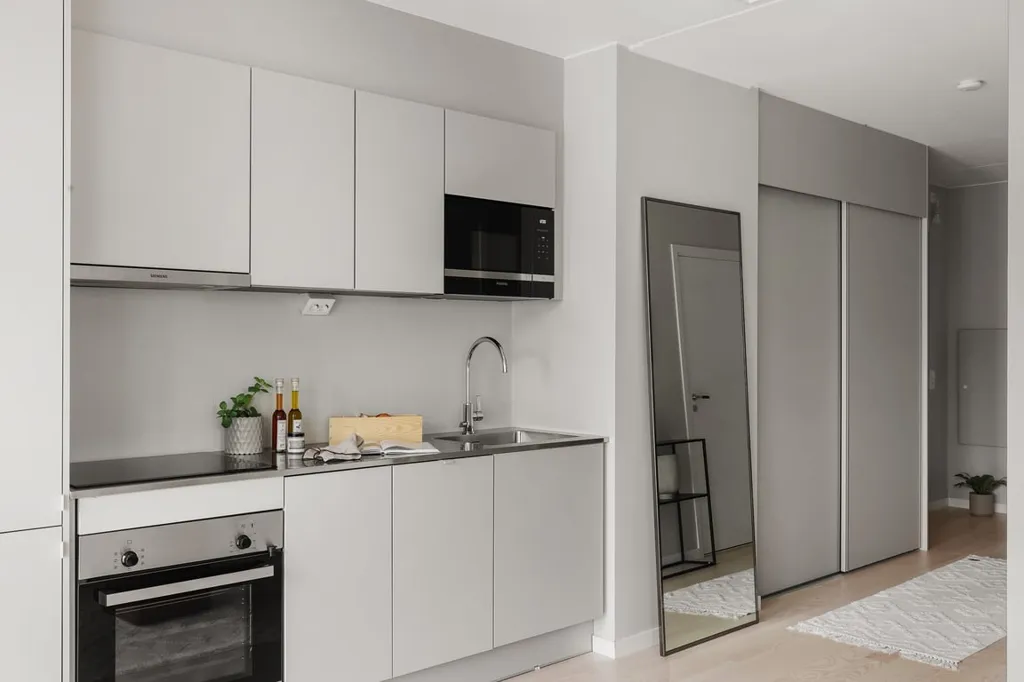 Cuisine - Apartment with Balcony and Garden View in Malmö