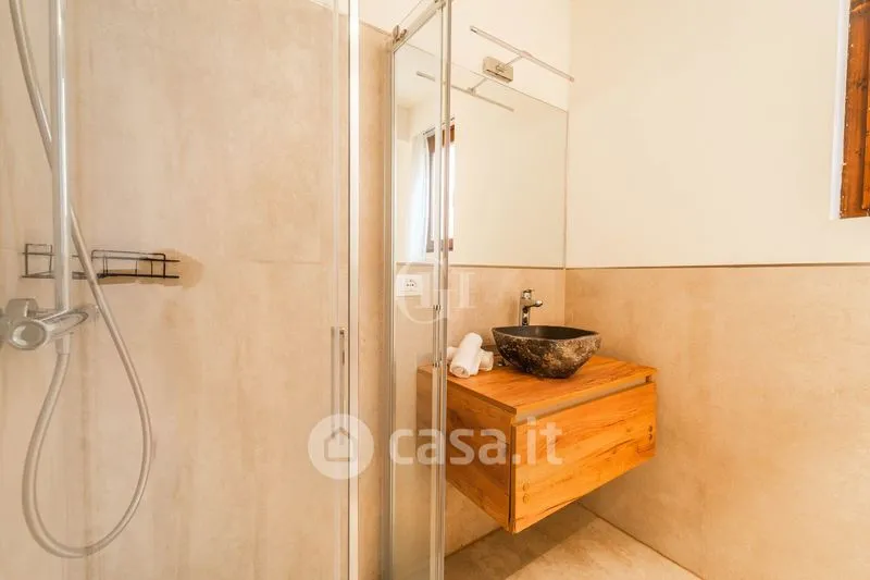 Bathrooms - Centrally Located Flat with Sea View in Torbole