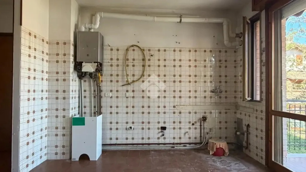 Bathrooms - Two-Bedroom Apartment with Balcony in Cavriago