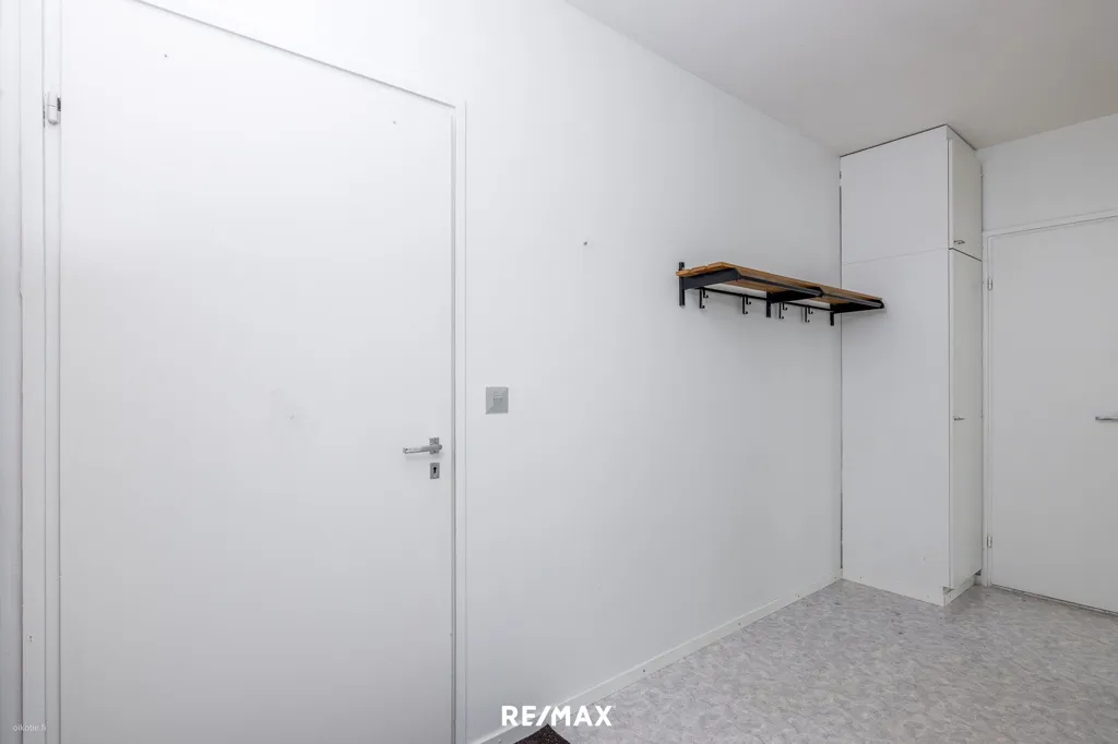 Buanderie - Bright Two-Bedroom Flat with Garden View in Kirkkonummi