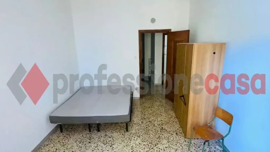 Chambres - Four-Bedroom Apartment in Salerno