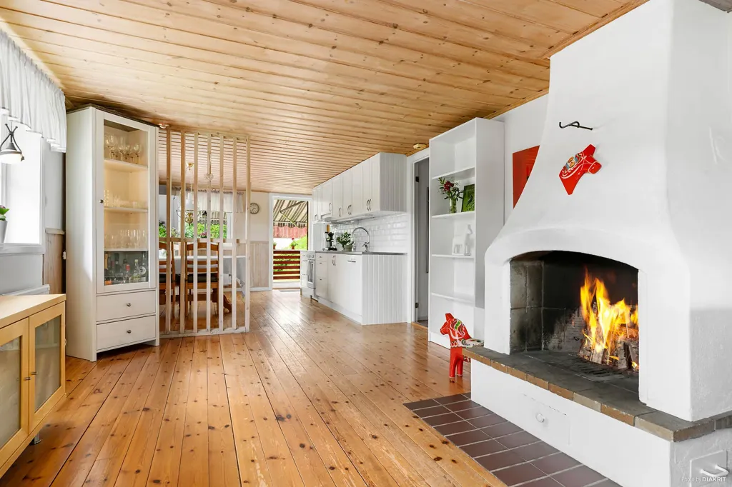 Wohnzimmer - Red Brick Cottage with Lake View in Sågmyra