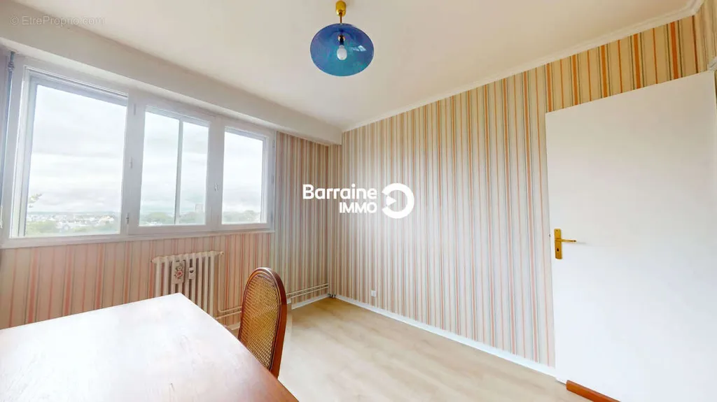 Dining Room - Lorient North Apartment with Balcony and Parking