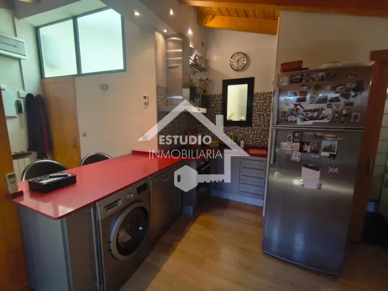 Kitchen - Modern Loft with Wood Beams in Logroño