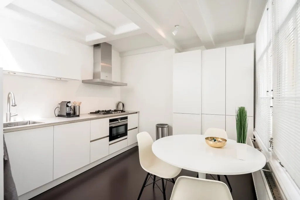 Kitchen - Renovated Apartment with Garden View in Amsterdam
