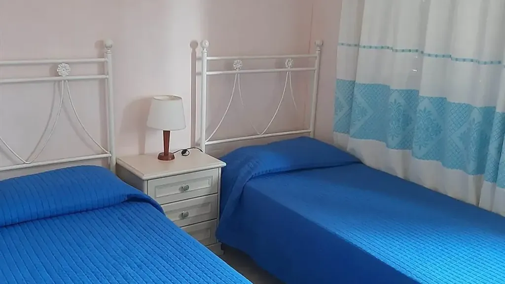 Bedrooms - Rustic Apartment with Private Garden in Pula