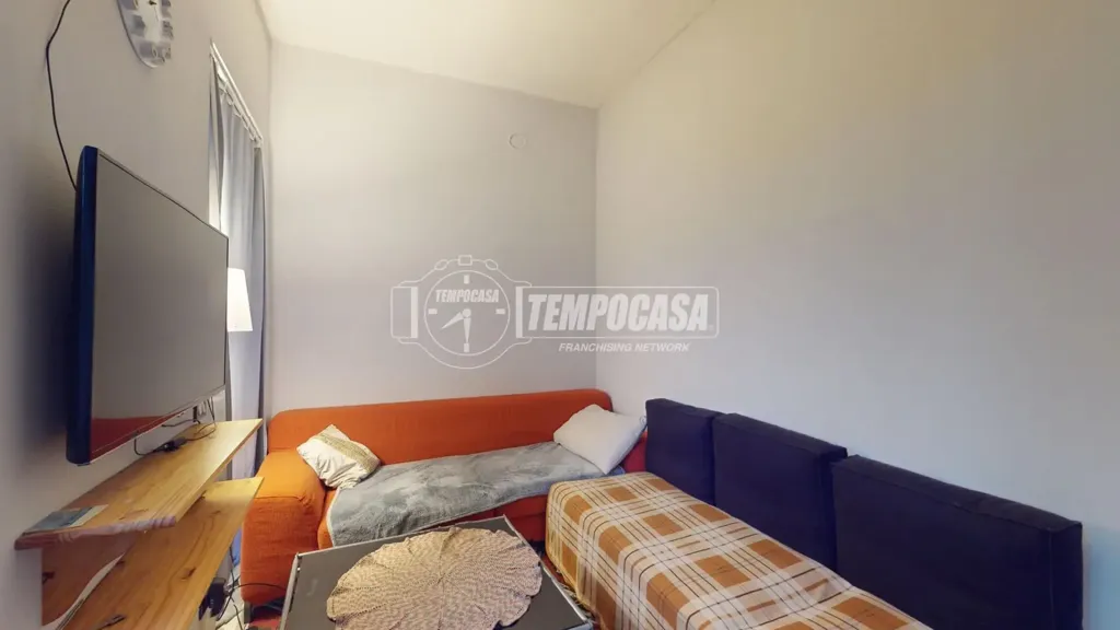 Séjour - Three-Bedroom Apartment with Courtyard in Besana in Brianza