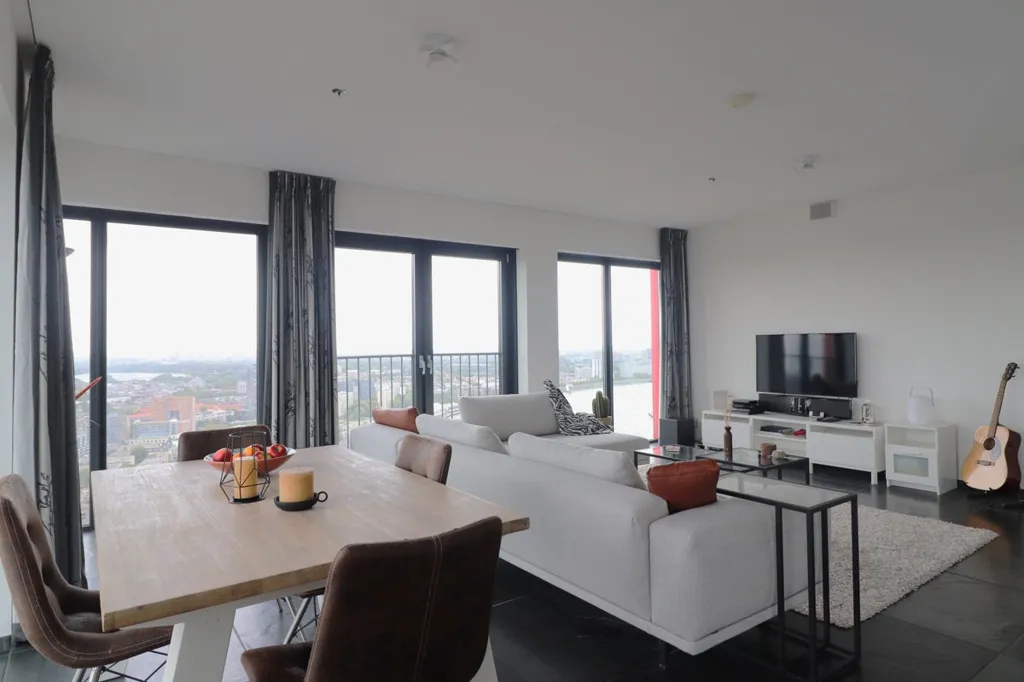 Living Room - Furnished Apartment with City View in Rotterdam