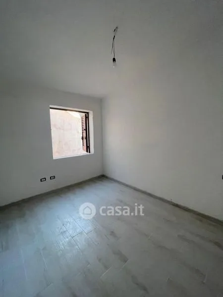 Rooms - Two-Level Apartment with Veranda in Torpè