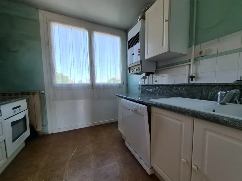Cuisine - Appartement Lumineux avec Balcon à Résidence Le Bretagne